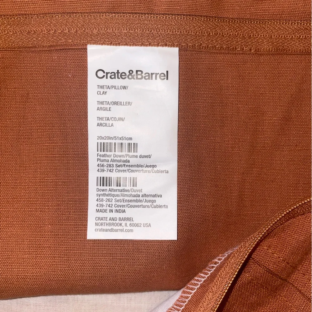 Crate & Barrel burnt orange pillow cover